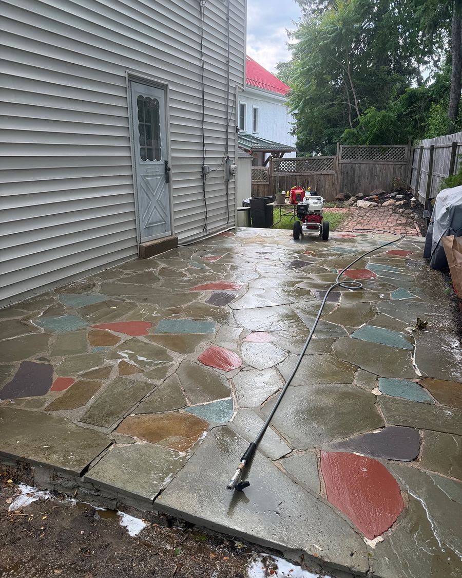 The same Havertown, PA flagstone patio after washing, the red, teal, slate and tan stones showing through