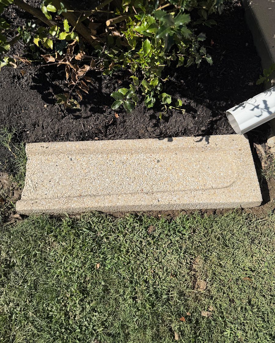 The same Drexel Hill, PA splash block after washing, the stone aggregate clean and bright